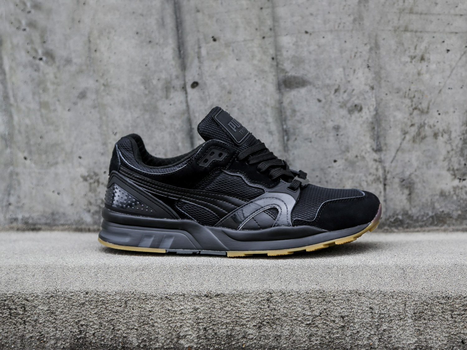 All black puma trinomic on sale