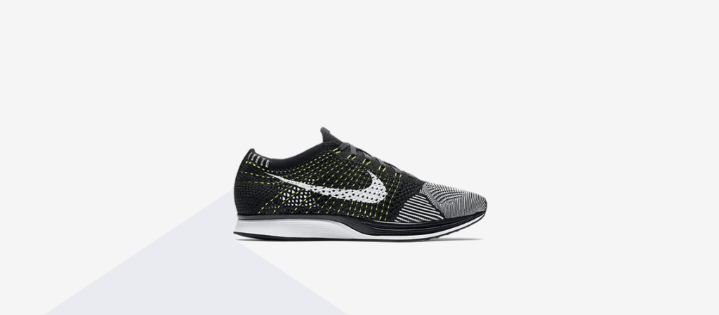 nike flyknit racer black white yellow
